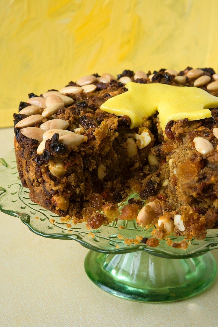 Fruit cake with nuts and marzipan, sliced