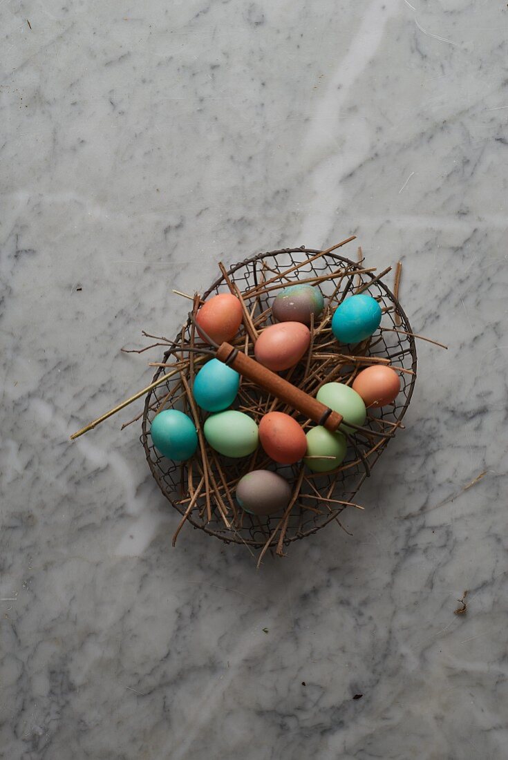 Easter eggs in a wire basket