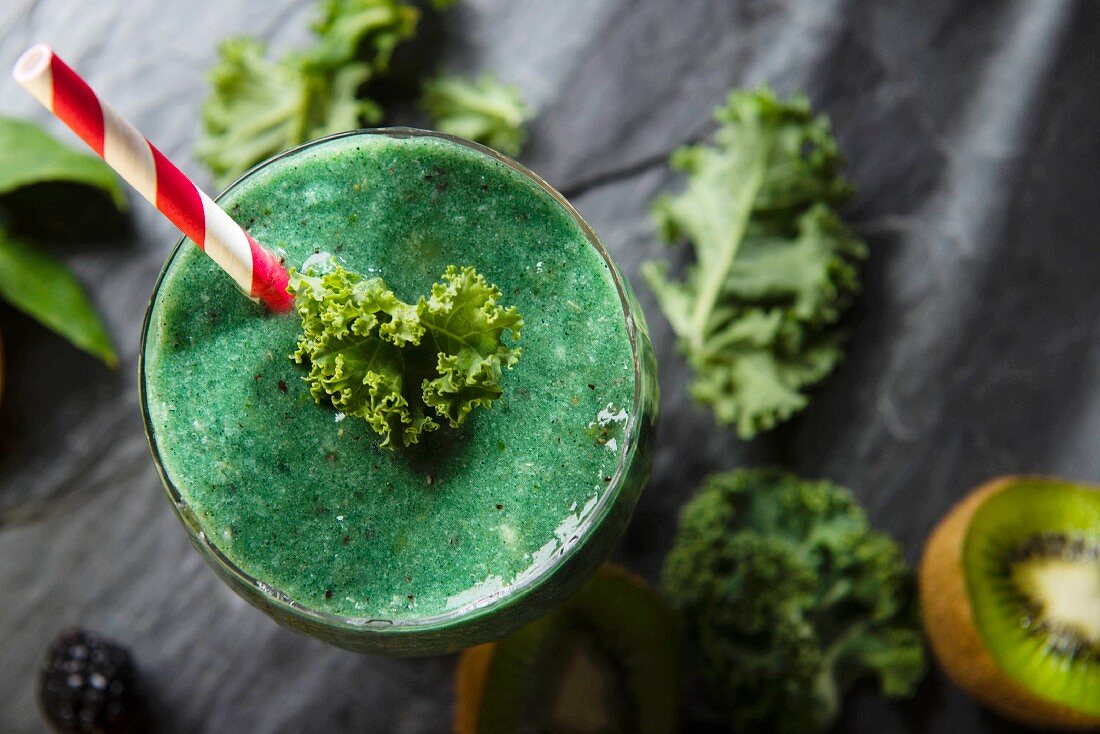 A fruit smoothie with kale and kiwi