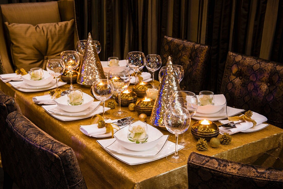 Elegant African decorations on table set for Christmas dinner