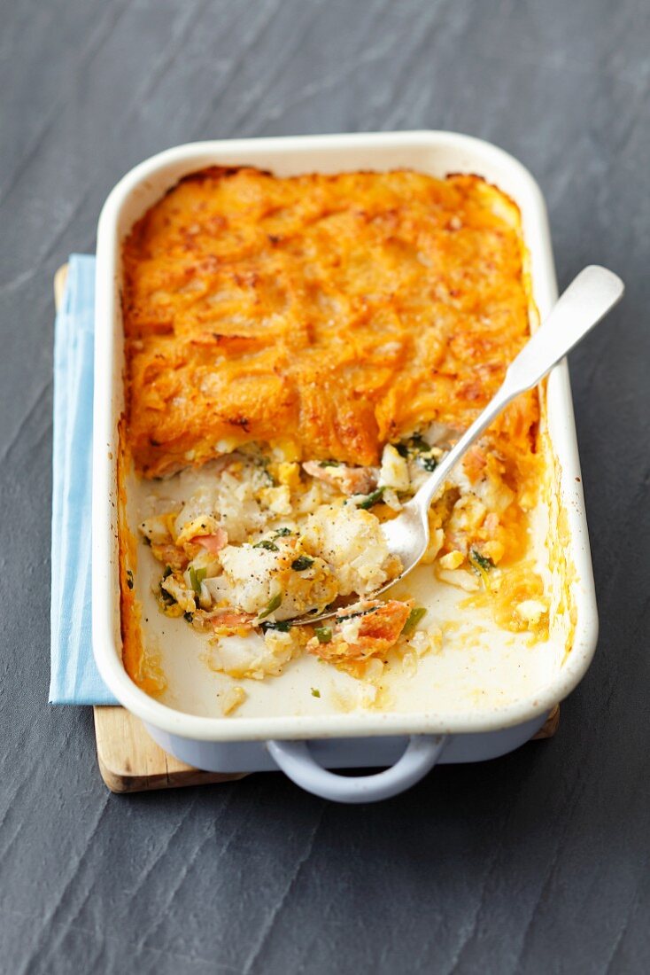 Cod and smoked fish bake with a curried potato topping