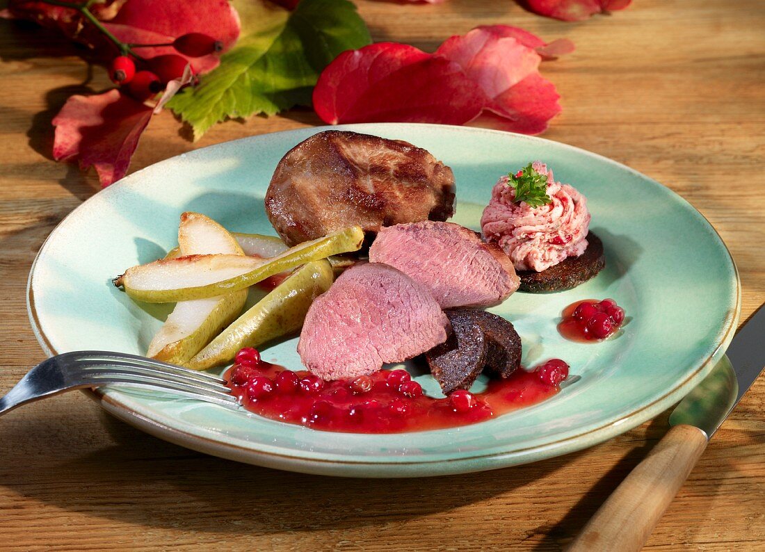 Venison fillet with pears and lingonberry sauce