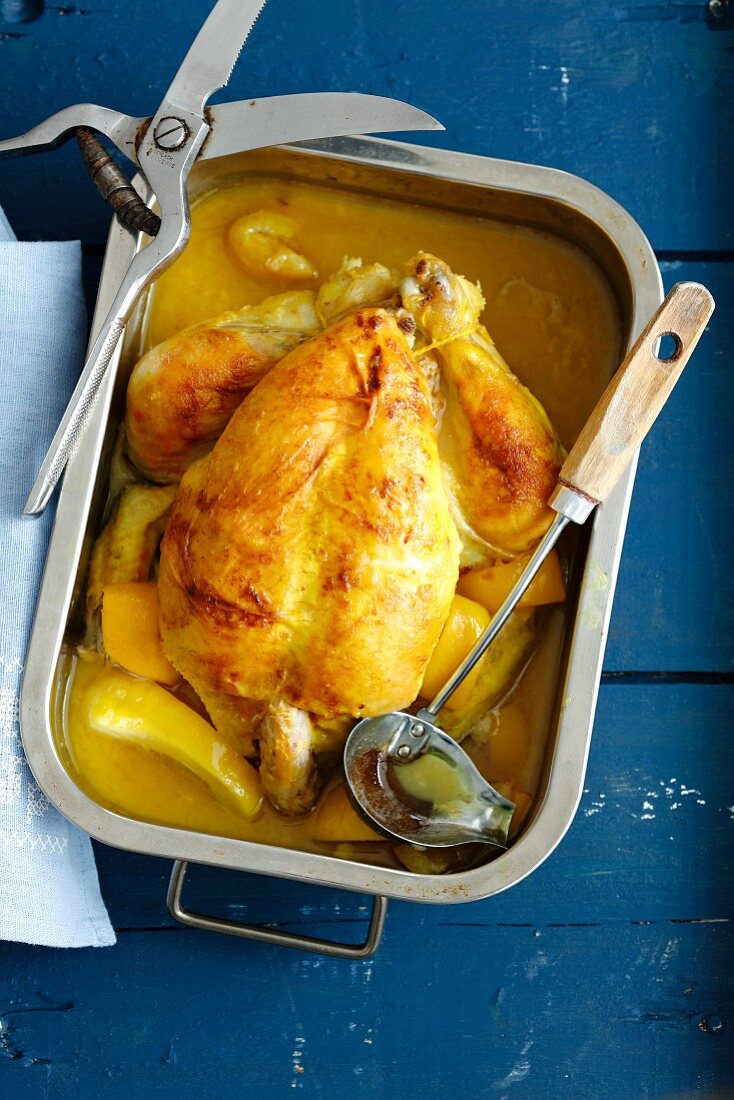 Roast chicken with lemon, butter and turmeric