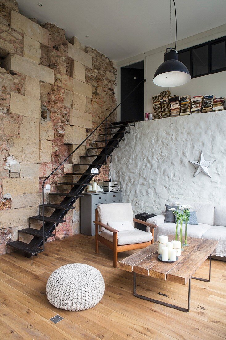 Loft apartment with rustic stone walls in converted barn