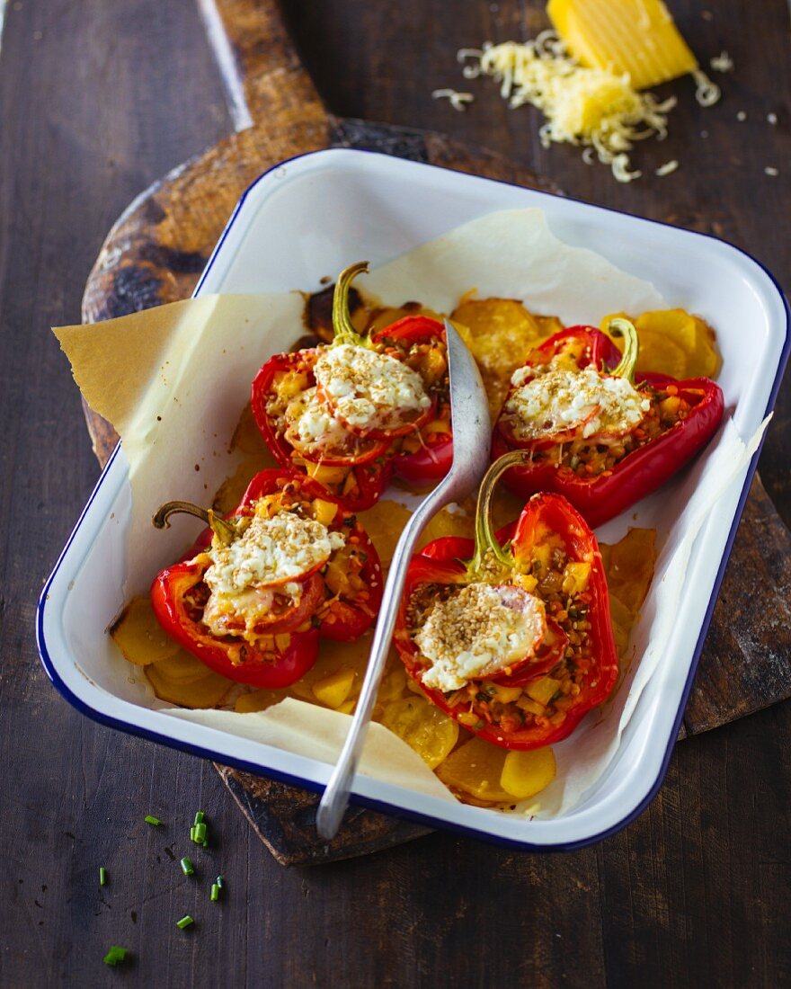 Peppers filled with lentils on baked potatoes