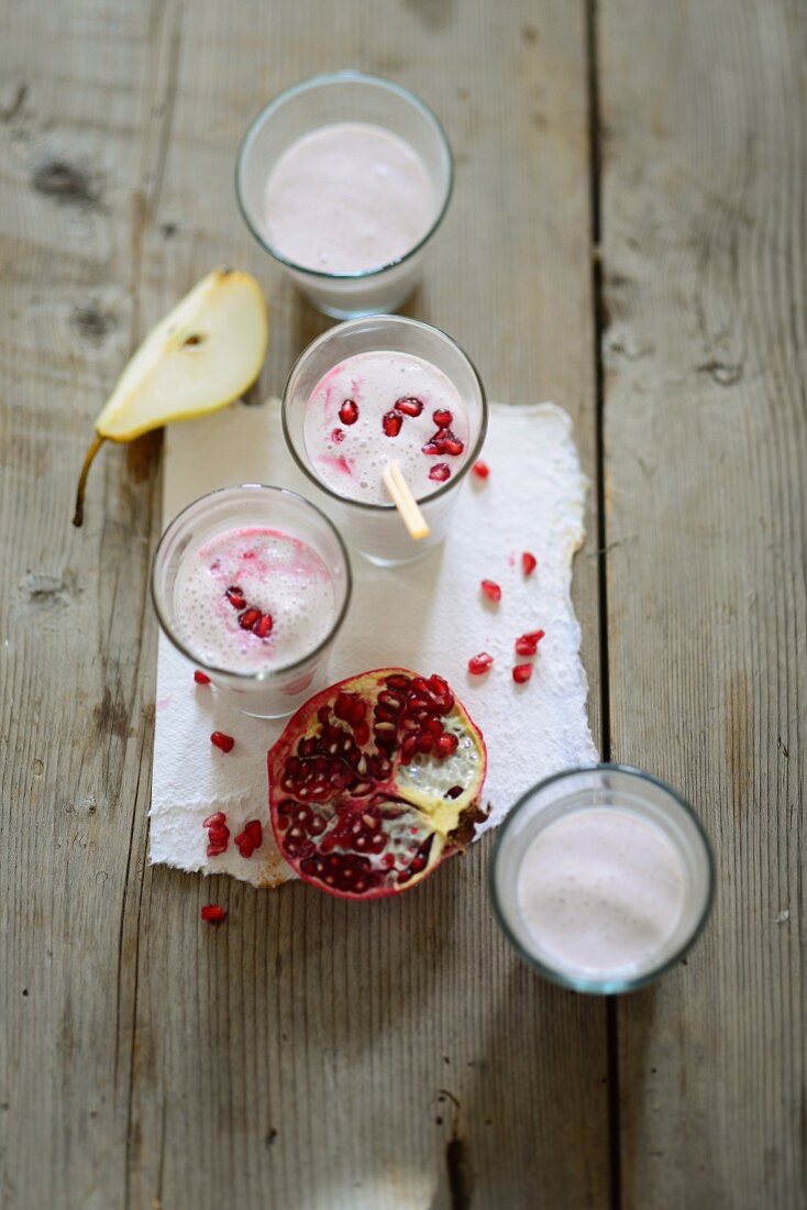 Pear and soya drink with pomegranate seeds