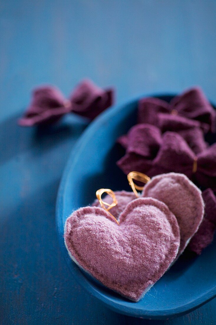 Felt love-heart pendants and small bows