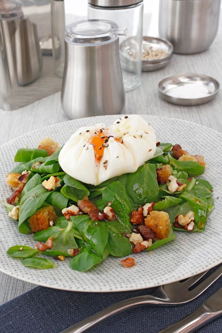 Watercress salad with a poached egg