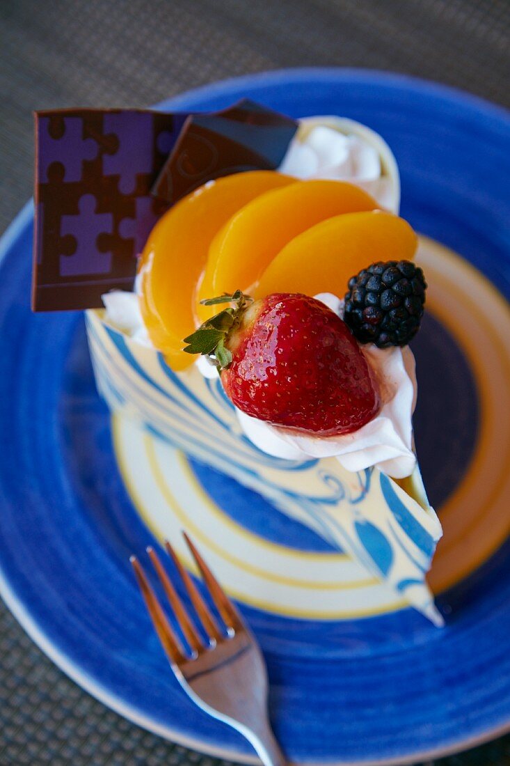 A slice of white cake with fruit (USA)