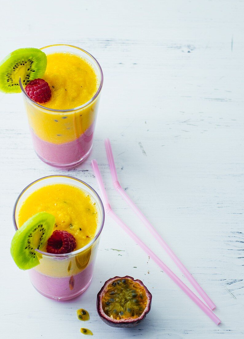 Tropical cocktails with coconut, passion fruit, mango and pineapple
