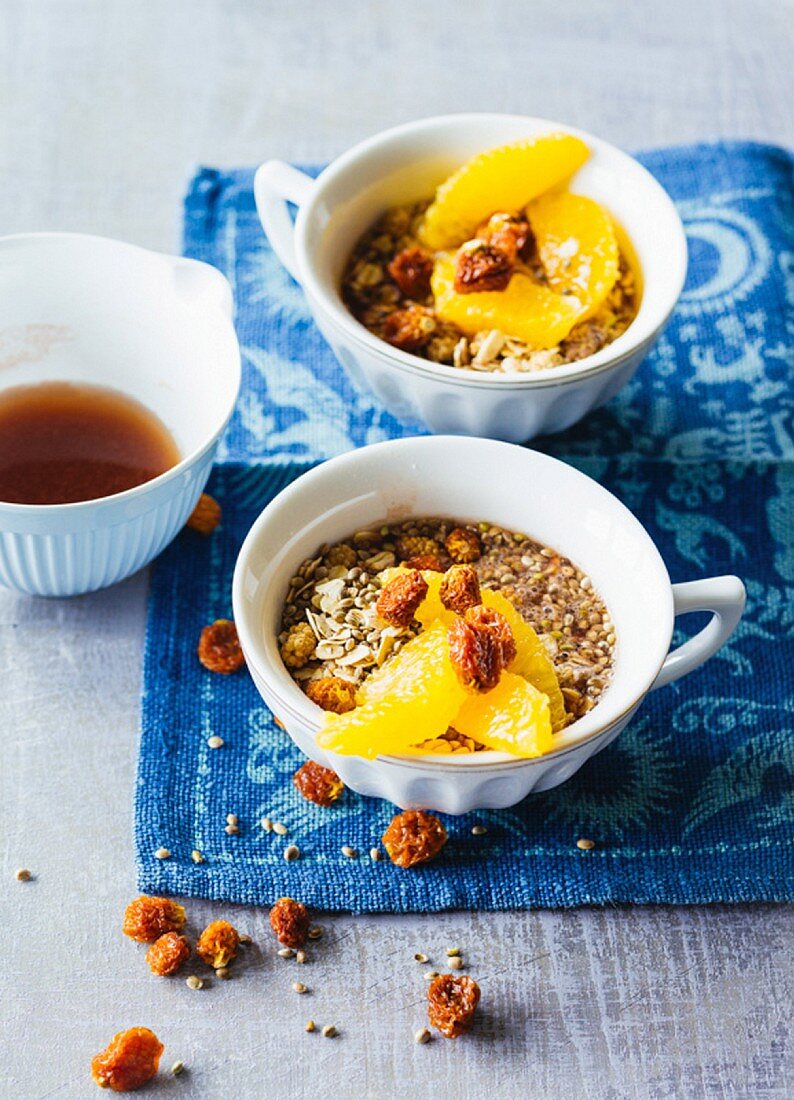 Oat and hemp muesli with oranges and dried physalis