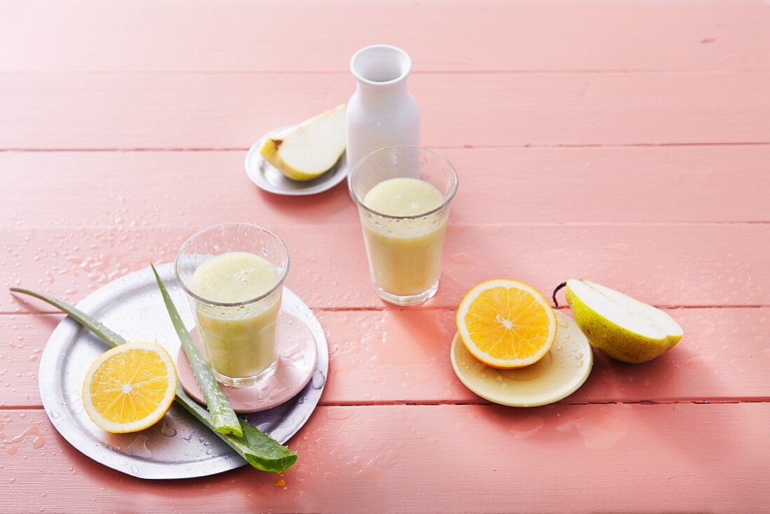 Pear and orange smoothies with aloe vera and coconut