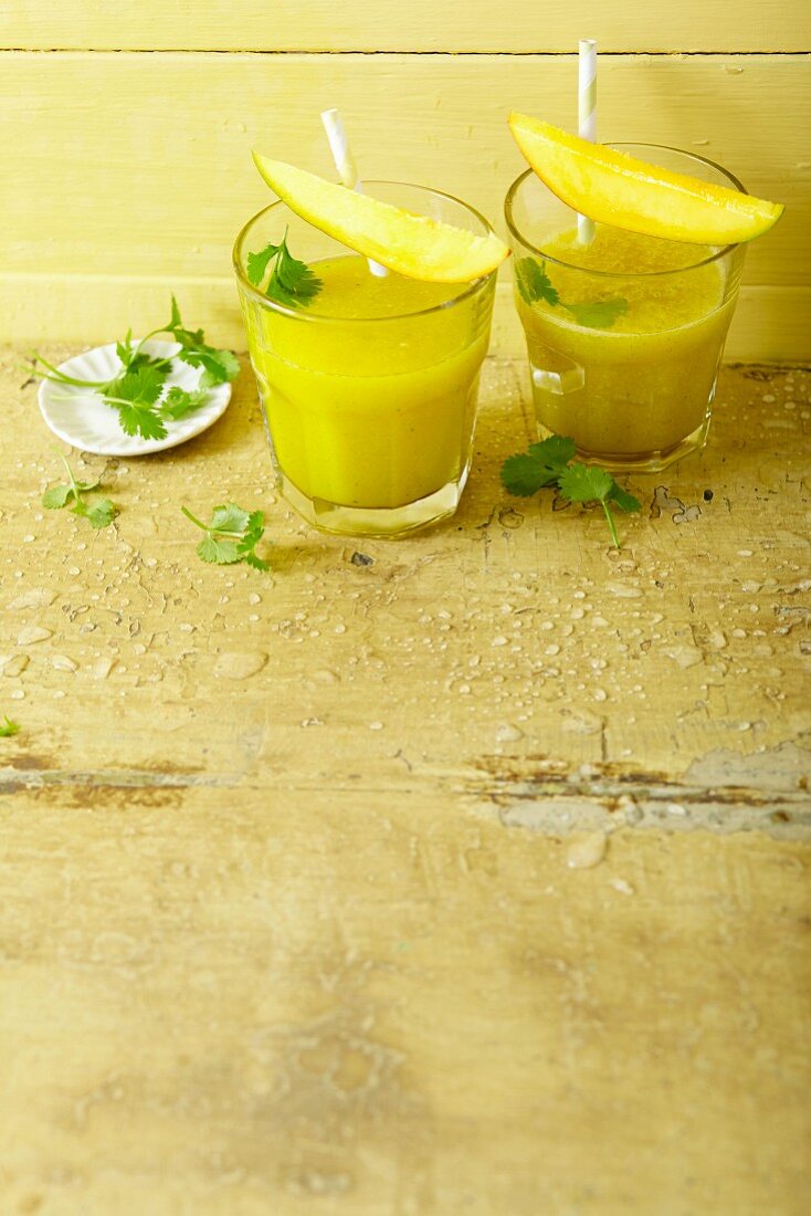 Mango and coconut smoothies with coriander and turmeric