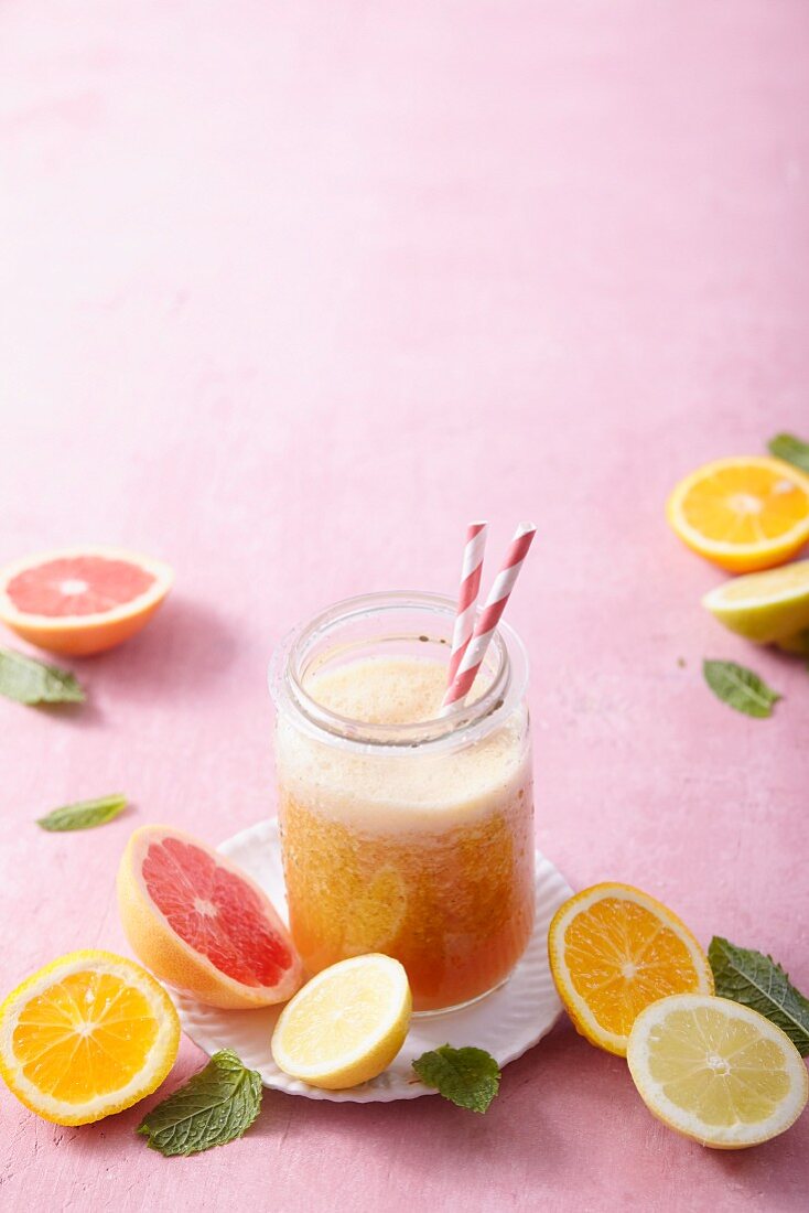 A citrus fruit smoothie with mint and turmeric
