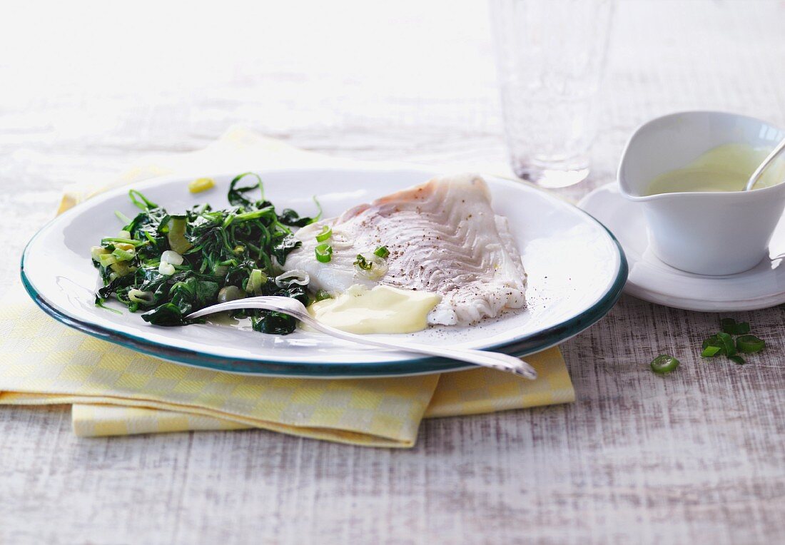 Steamed cod with spinach and a soy and mustard dressing