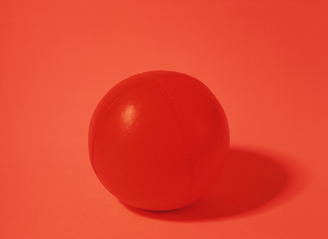 Red ball under red light