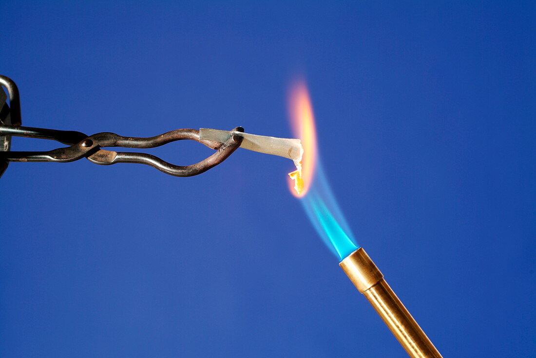 Heating zinc in a flame