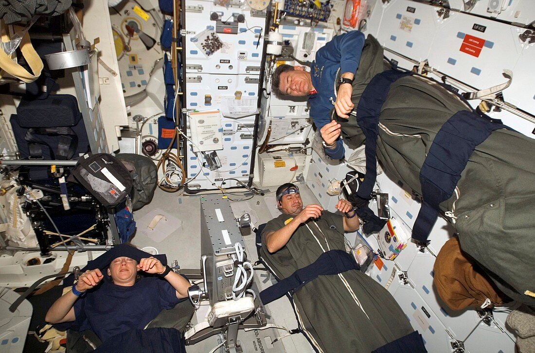 Space Shuttle astronauts sleeping