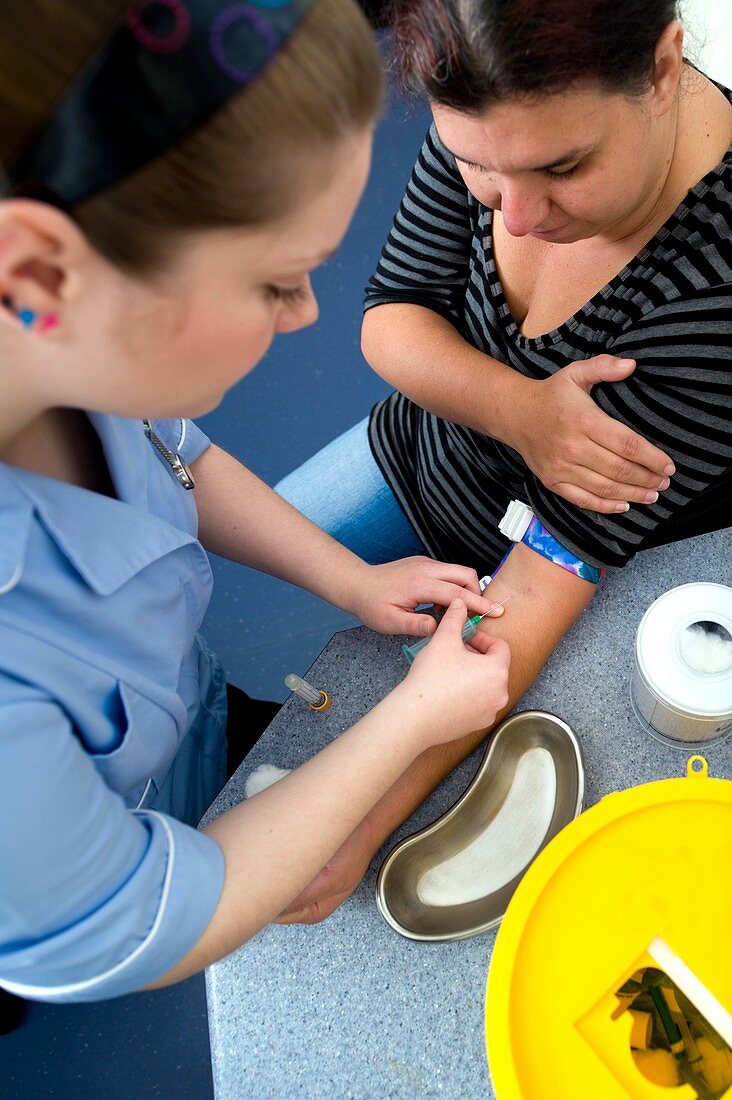 Nurse taking a blood sample