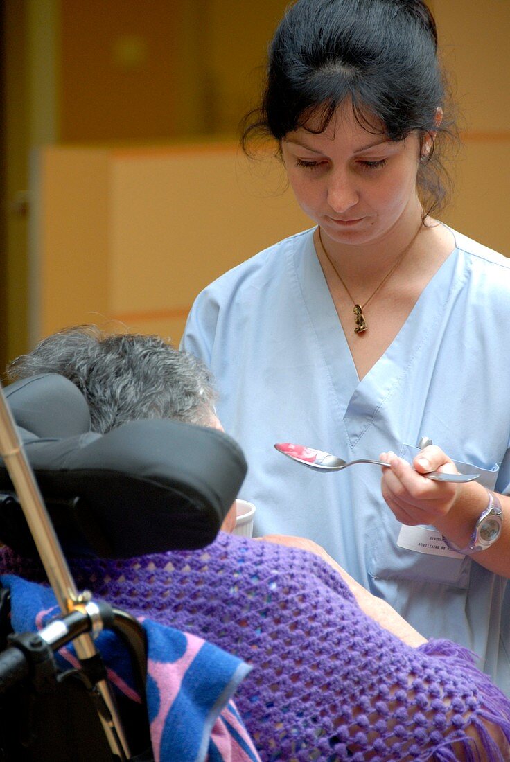 Alzheimer's patient is spoon fed