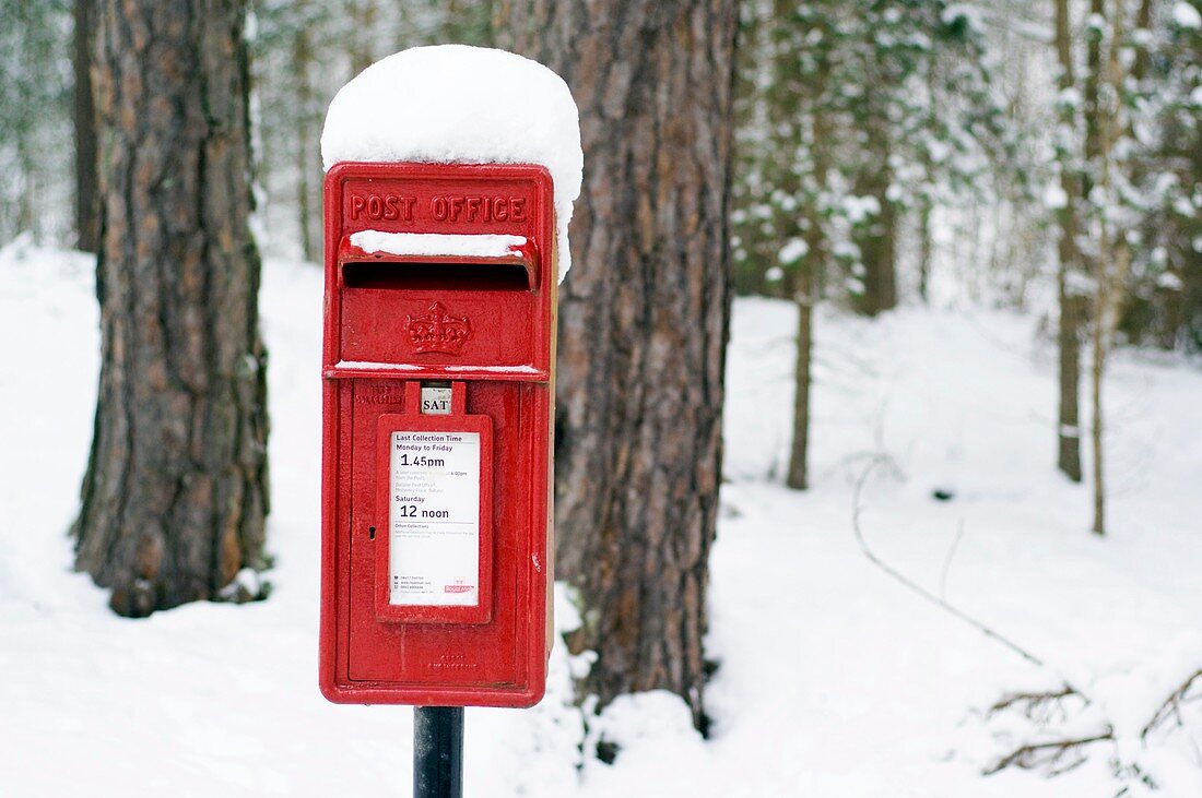 Red post box in the snow