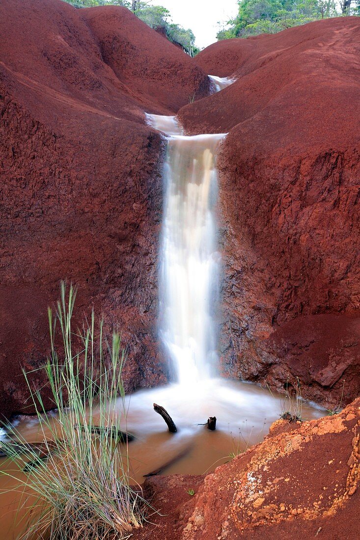 Waterfall in volcanic terrain
