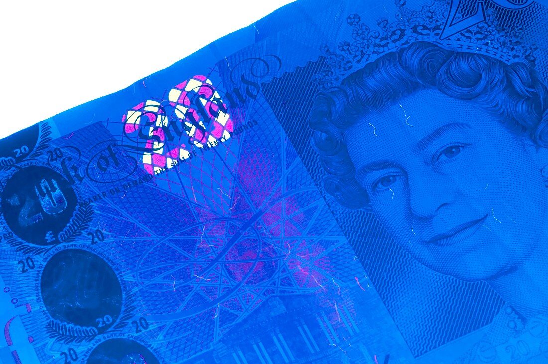 Twenty pound banknote in UV light
