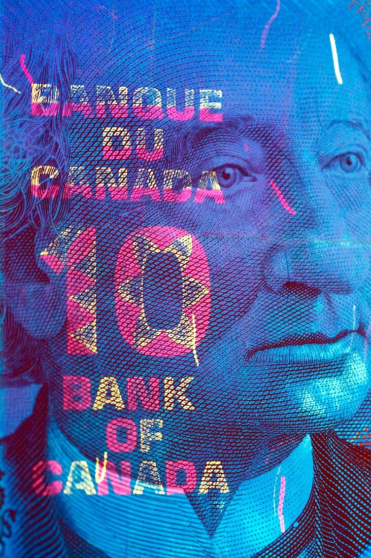 Canadian banknote in UV light
