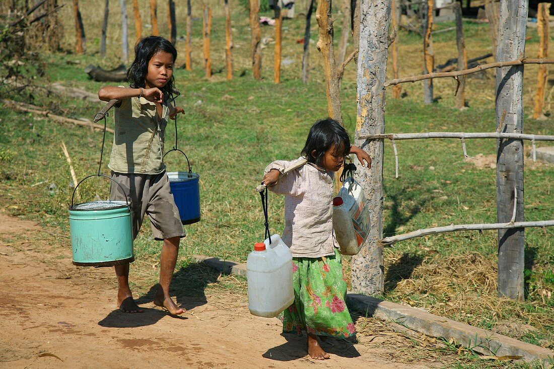 Children carrying water,Cambodia