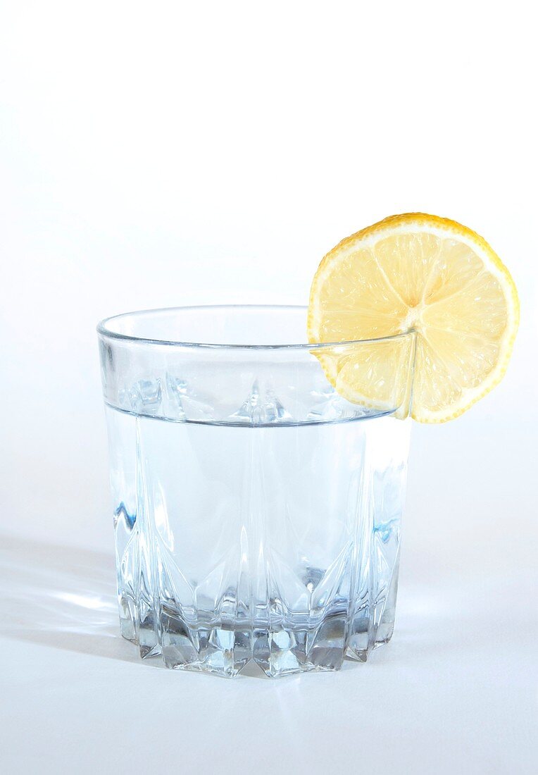 Tonic water with lemon in glass