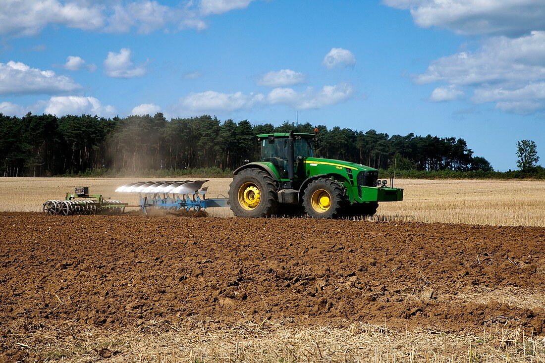 Tractor ploughing a field