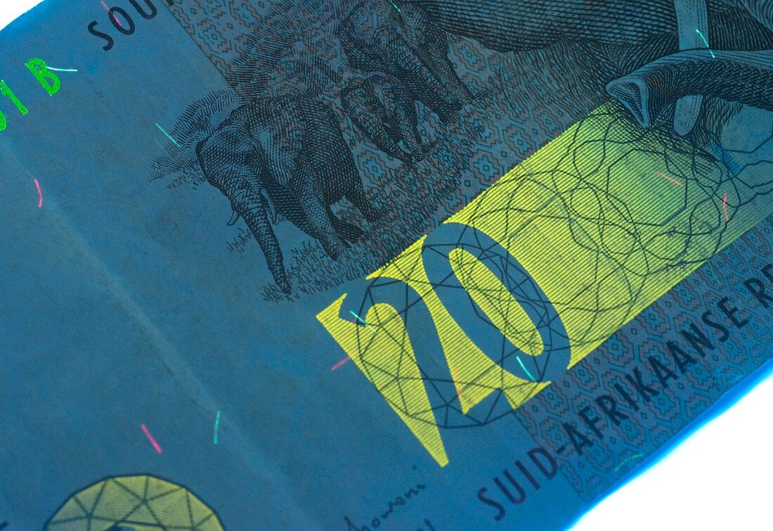 South African banknote in UV light