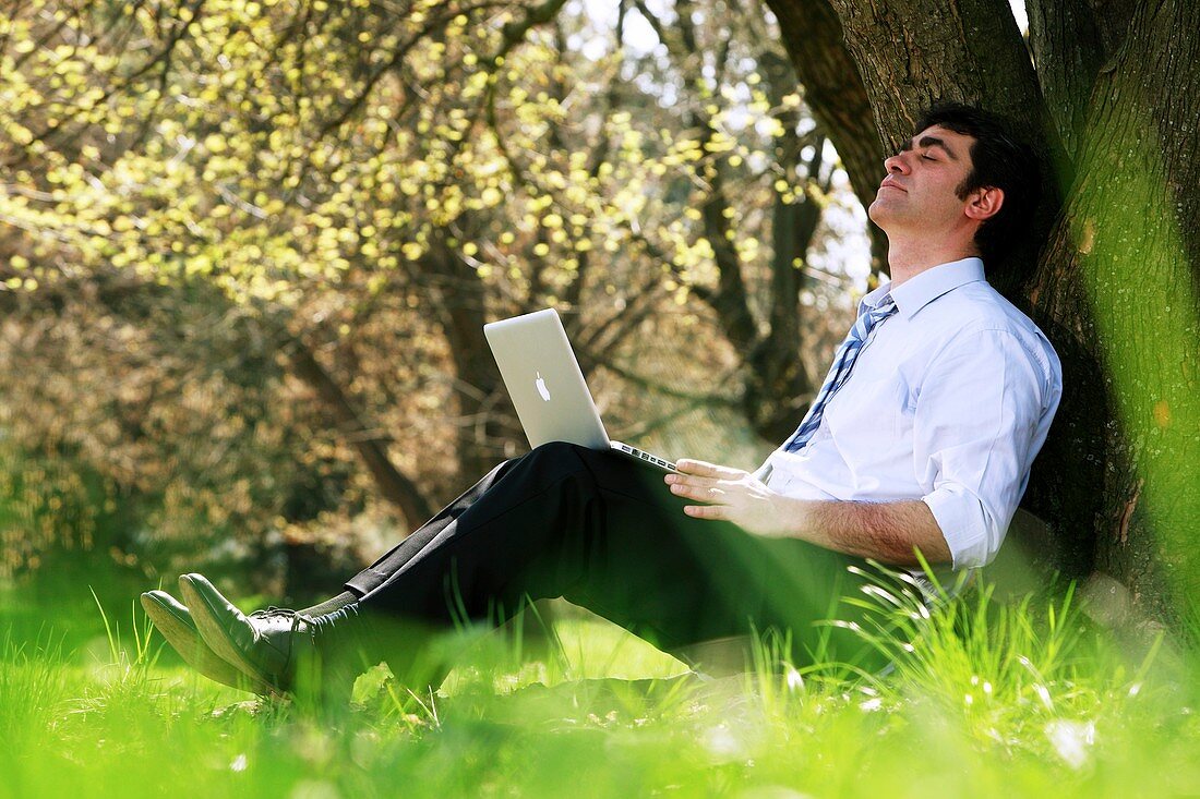 Office worker in a park