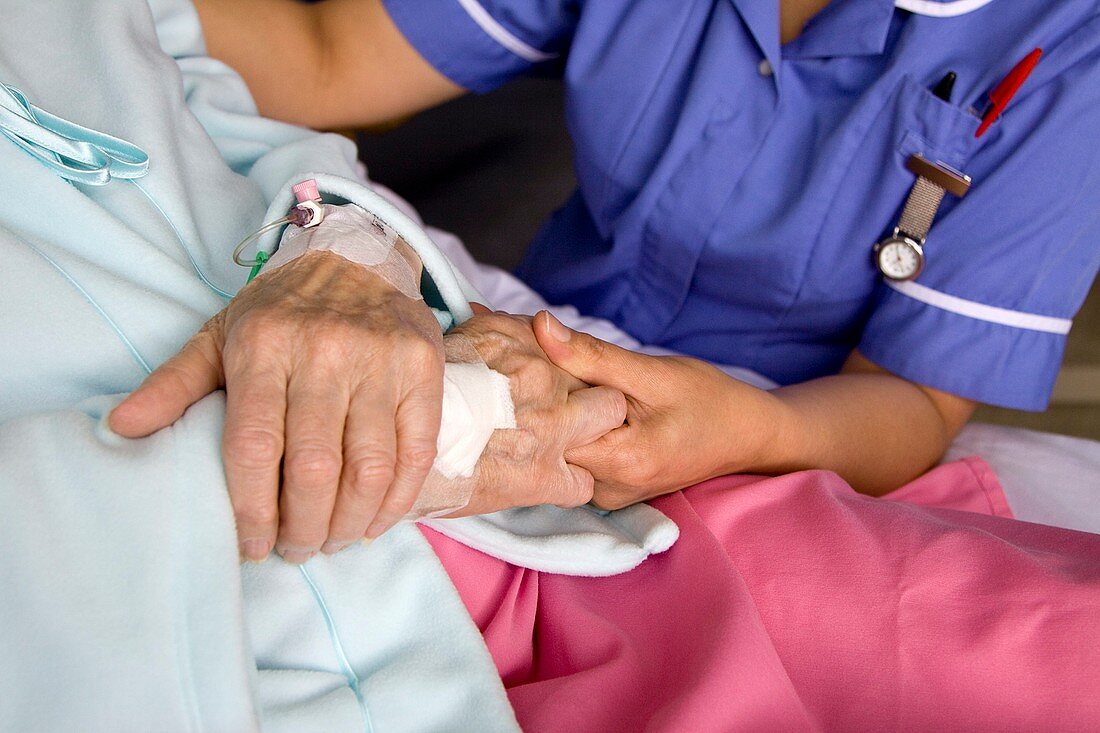 Hospital nurse and patient