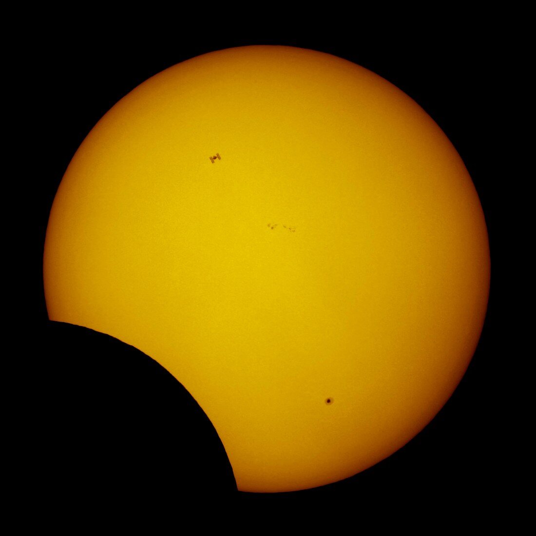 Partial solar eclipse and ISS,04/01/2011