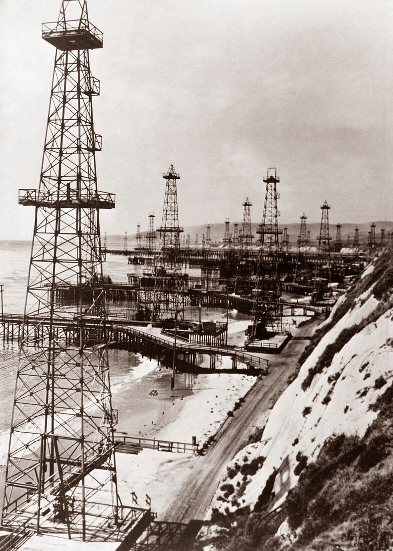 Beach-side oil wells,historical image