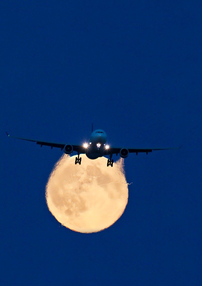 Airbus 330 passing in front of the moon