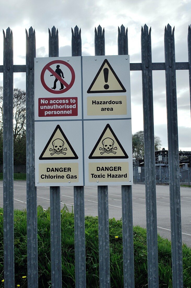 Hazard warning signs outside factory