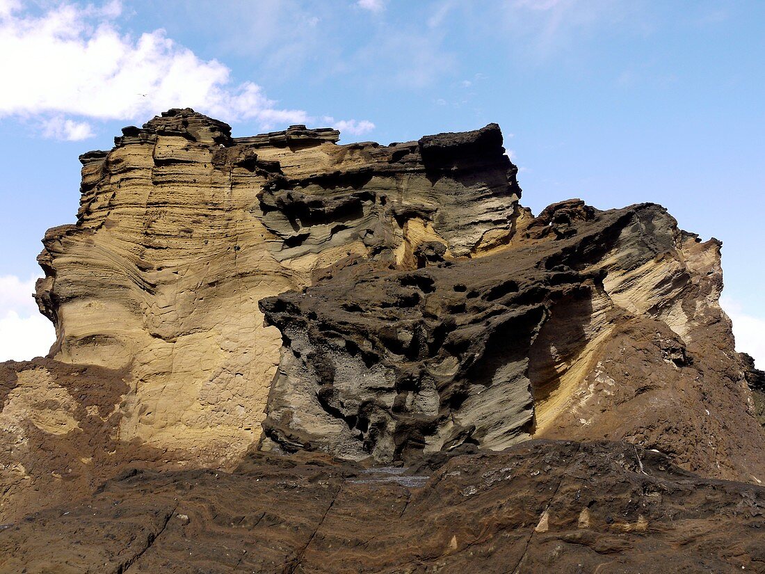 Eroded cliffs of sandstone and lava