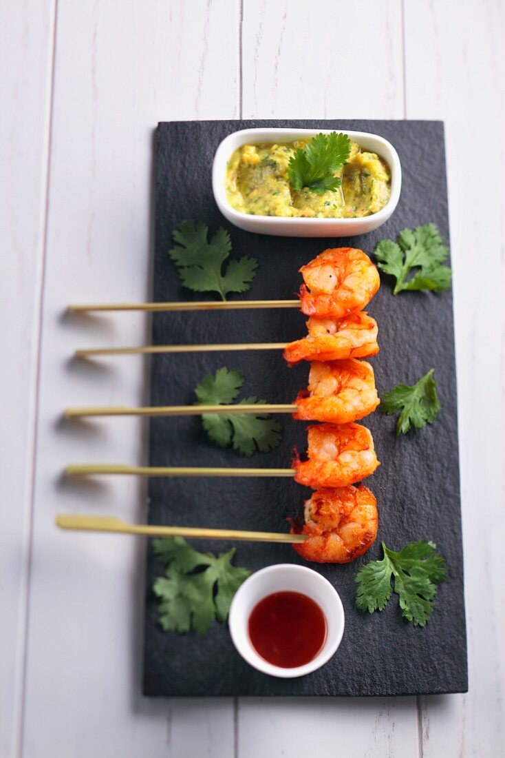 Prawn skewers with guacamole and coriander