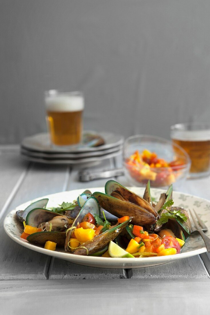 Mussels in a beer broth with mango salsa