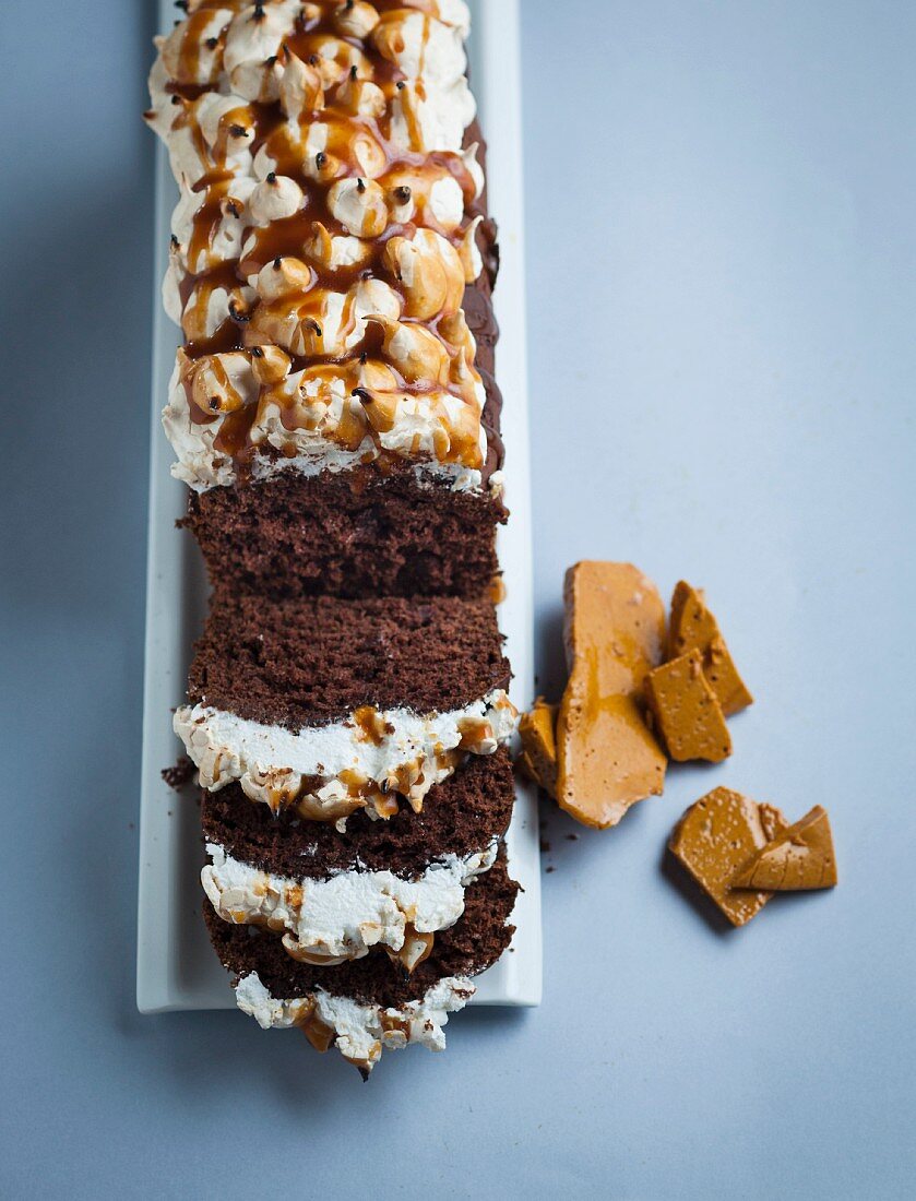 Date and banana chocolate cake with meringue and caramel
