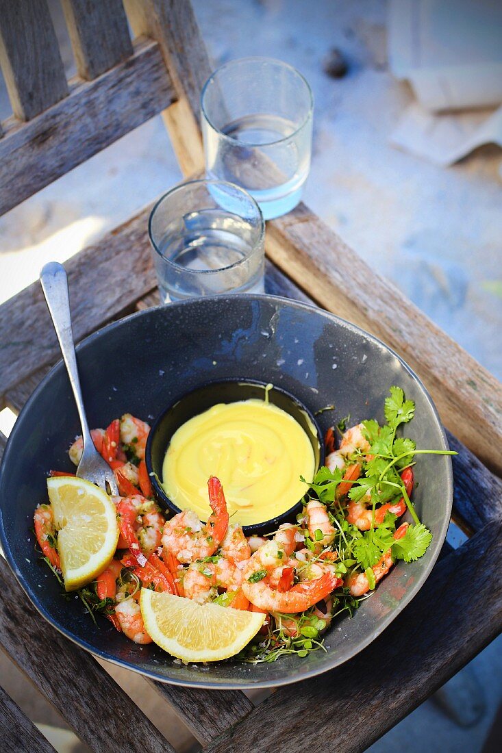 Herb prawns with a curry dip