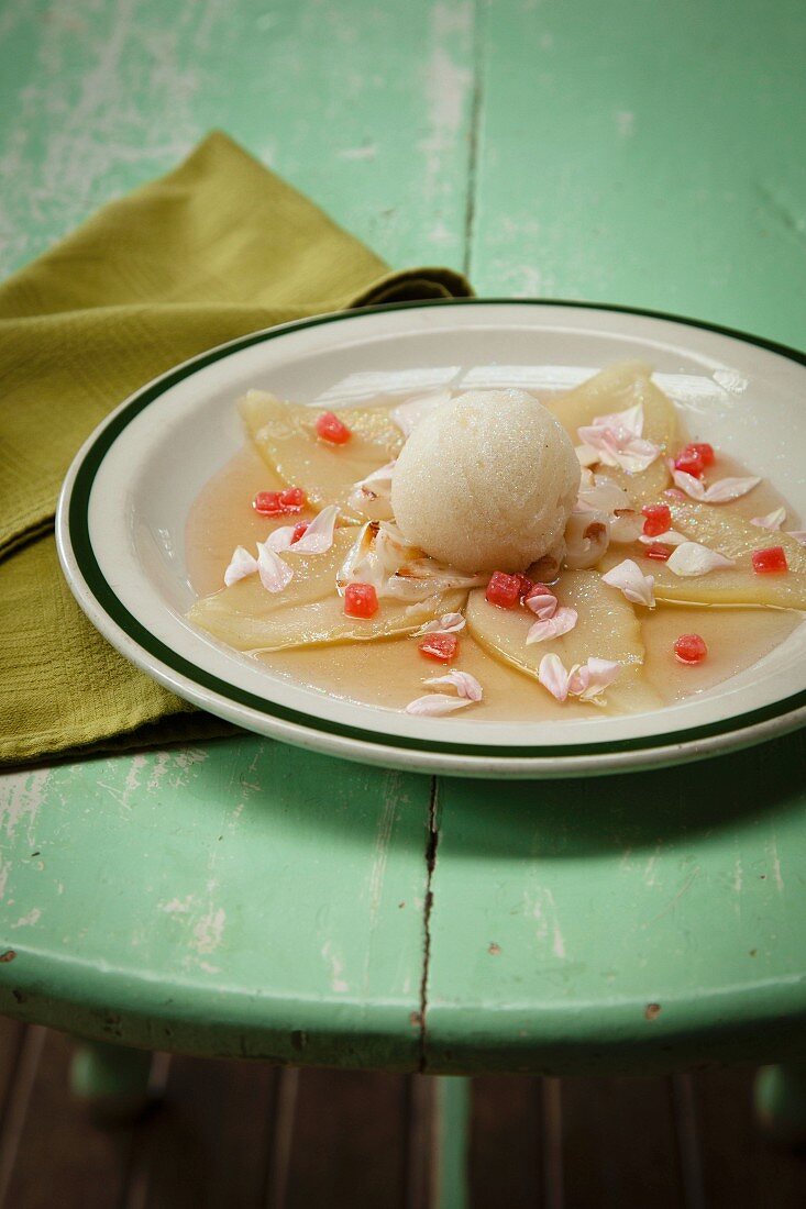 Geranium sorbet on a pear and lychee salad