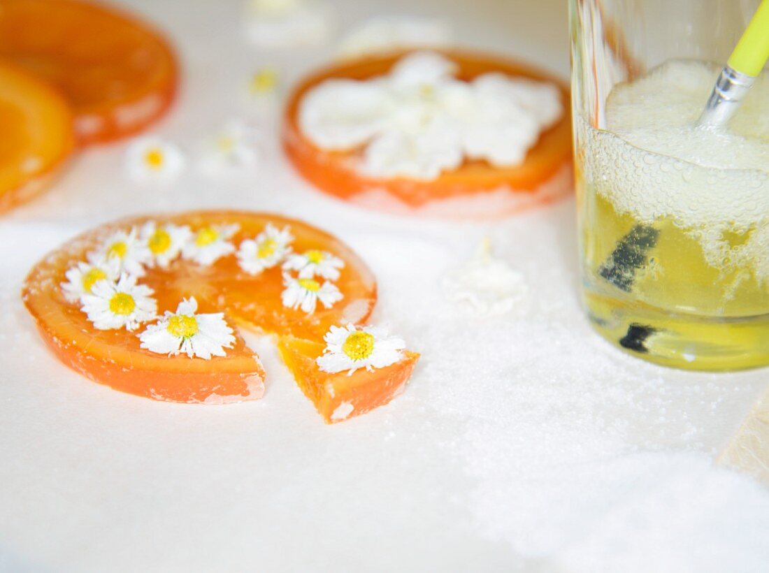 Candied orange peel decorated with daisies