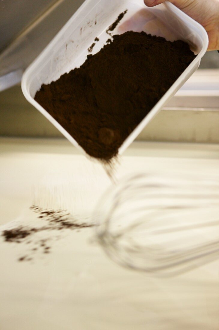 Chocolate ice cream being made in a factory, Dorset, England