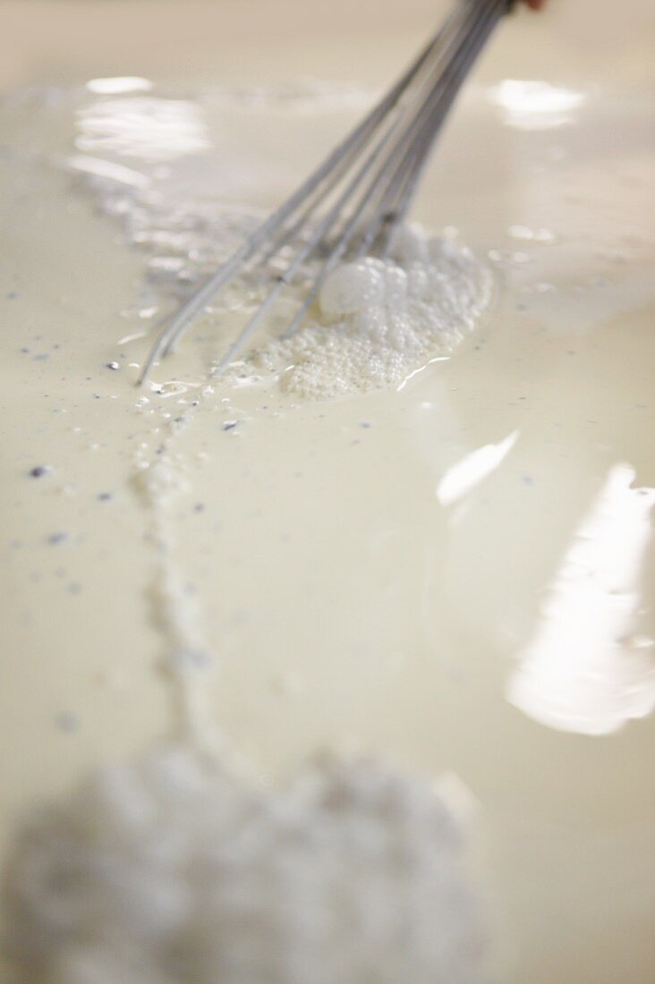 Ice cream being made in a factory, Dorset, England