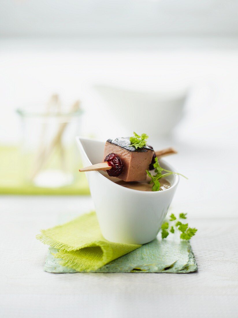 Bay bolete mushroom soup with goose liver pate