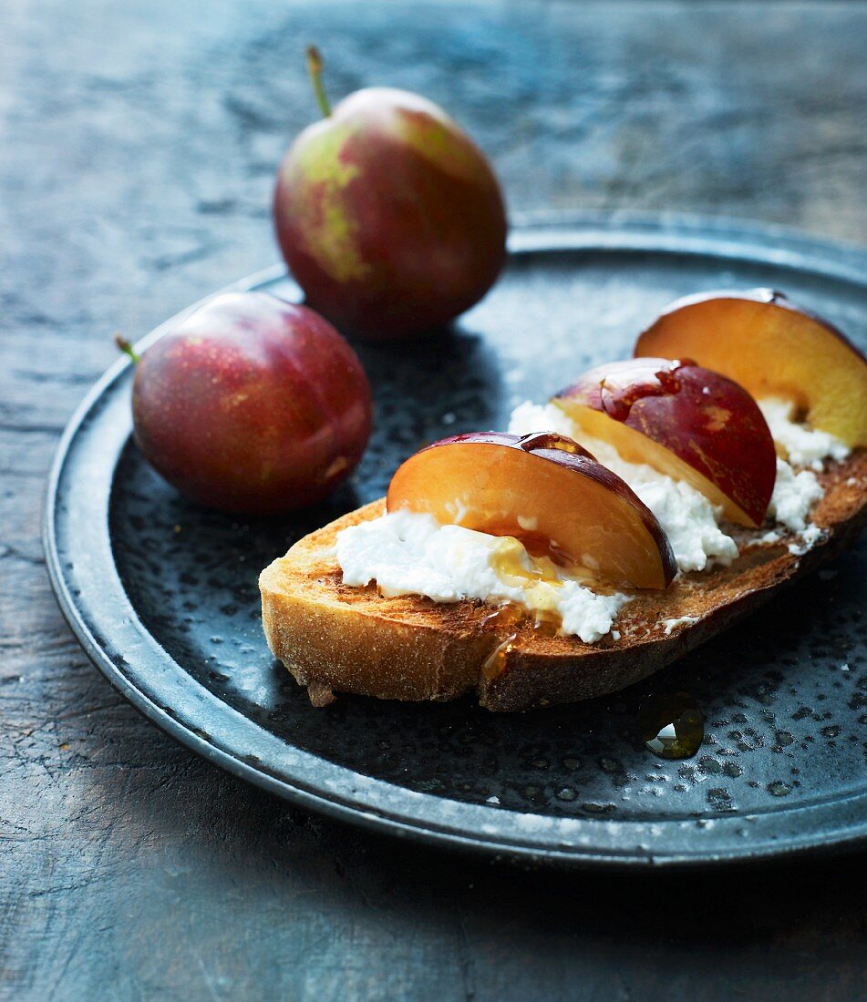 French toast with plums, cream cheese and honey