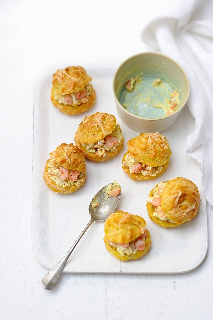 Curry gougeres filled with shrimps and cream cheese